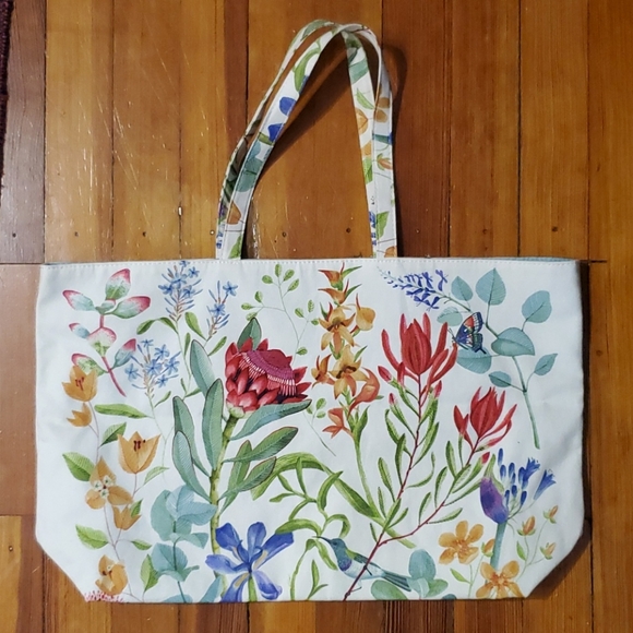 Estee Lauder Handbags - Estee Lauder floral bag. NWOT.
